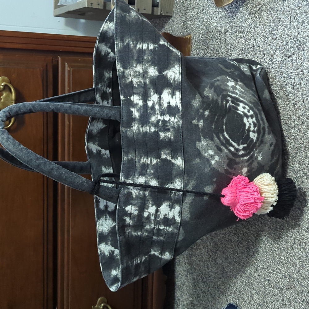 Brand new black tie dye tote with multi colored ornaments